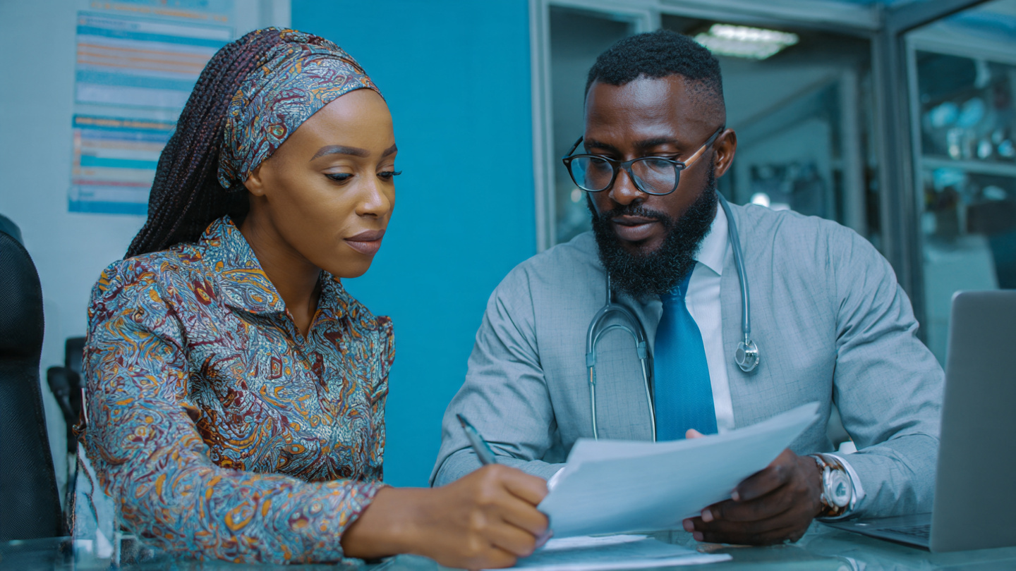 a_nigerian_professional_reviewing_health_insurance_documents